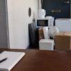 玄関先にまとめた不用品と見積のメモ